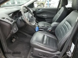 2015 Ford Escape Titanium with VIN 1FMCU0JX5FUA24210, listed as a Copart auction lot 57270855 with 115,613 mi miles and Salvage title. Bid and sale history available at DreamBid. Image 7.