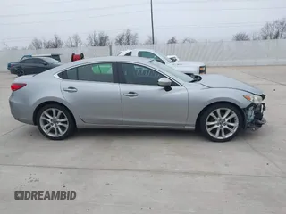 2015 Mazda 6 i Touring with VIN JM1GJ1V56F1209476, listed as a IAAI auction lot 41644215 with 112,255 mi miles. Bid and sale history available at carsss.com. Image 13.