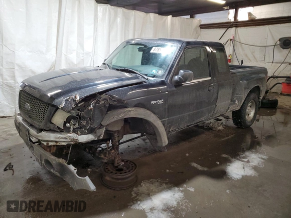 2002 Ford Ranger with VIN 1FTZR15U52PA08409, listed as a Copart auction lot 87858015 with 128,892 mi miles and Salvage Title. Bid and sale history available at DreamBid. Image 1.