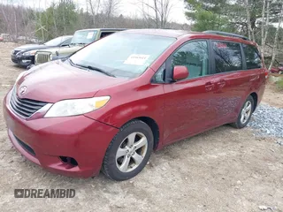 2011 Toyota Sienna LE AAS with VIN 5TDKK3DC3BS034894, listed as a IAAI auction lot 41983614 with 217,308 mi miles. Bid and sale history available at carsss.com. Image 2.
