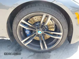 2016 BMW M4 z VIN WBS3R9C59GK336073, wystawiony jako IAAI lot #42165008 z przebiegiem 73 673 mil mil oraz . Historia ofert i sprzedaży dostępna na DreamBid. Obrazek 21.