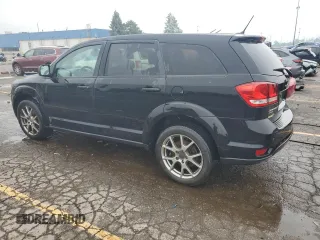 2014 Dodge Journey R/T with VIN 3C4PDDEG2ET309284, listed as a Copart auction lot 59350205 with 132,903 mi miles and Salvage title. Bid and sale history available at DreamBid. Image 2.