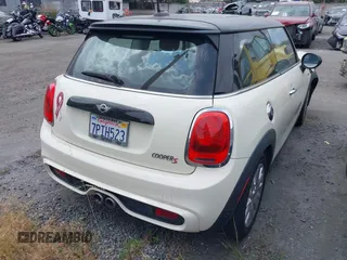 2015 MINI Hardtop S z VIN WMWXP7C55F2A39819, wystawiony jako IAAI lot #42338717 z przebiegiem 64 961 mil mil oraz . Historia ofert i sprzedaży dostępna na DreamBid. Obrazek 4.