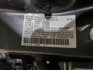 2022 Honda Insight EX z VIN 19XZE4F5XNE012867, wystawiony jako Copart lot #54153305 z przebiegiem Nie podano mil oraz Szkoda całkowita • Salvage title. Historia ofert i sprzedaży dostępna na DreamBid. Obrazek 12.