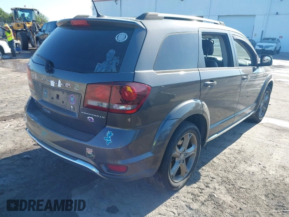 2016 Dodge Journey Crossroad Plus z VIN 3C4PDCGB0GT209506, wystawiony jako IAAI lot #42044055 z przebiegiem 93 115 mil mil oraz . Historia ofert i sprzedaży dostępna na DreamBid. Obrazek 4.