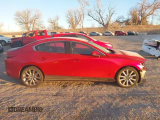 2021 Mazda 3 Select with VIN 3MZBPBBM5MM208715, listed as a IAAI auction lot 41342526 with 35,702 mi miles and . Bid and sale history available at carsss.com. Image 14.