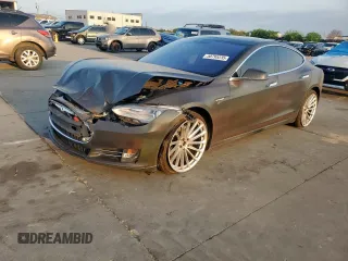 2013 Tesla Model S с VIN 5YJSA1CG0DFP15615, выставлен на аукционе Copart как лот 50795235 с пробегом 156 030 миль миль и Списание • Salvage title. История ставок и продаж доступна на DreamBid. Изображение 1.