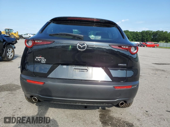 2020 Mazda CX-30 with VIN 3MVDMBBL9LM104107, listed as a Copart auction lot 62007684 with 52,753 mi miles and Salvage Title. Bid and sale history available at DreamBid. Image 6.