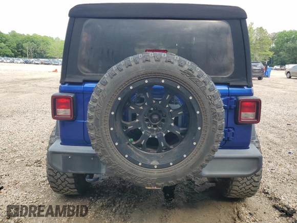 2018 Jeep Wrangler Unlimited Sport S with VIN 1C4HJXDG9JW290429, listed as a Copart auction lot 57270815 with 85,594 mi miles and Salvage title. Bid and sale history available at DreamBid. Image 6.
