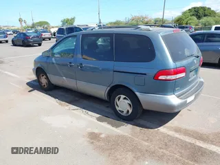 2001 Toyota Sienna LE with VIN 4T3ZF13C41U387019, listed as a IAAI auction lot 42540086 with 118,682 mi miles and . Bid and sale history available at DreamBid. Image 3.