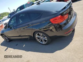 2014 BMW 3 Series 328i Gran Turismo xDrive with VIN WBA3X5C5XED242689, listed as a Copart auction lot 66156485 with 124,684 mi miles and Clean title. Bid and sale history available at DreamBid. Image 2.