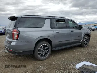 2021 Chevrolet Suburban RST with VIN 1GNSCEKD6MR234505, listed as a Copart auction lot 71460224 with 69,174 mi miles and Salvage title. Bid and sale history available at DreamBid. Image 3.