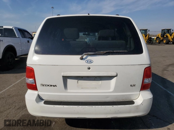 2005 Kia Sedona LX with VIN KNDUP132056685525, listed as a Copart auction lot 77790354 with 60,985 mi miles and Salvage Title. Bid and sale history available at carsss.com. Image 6.