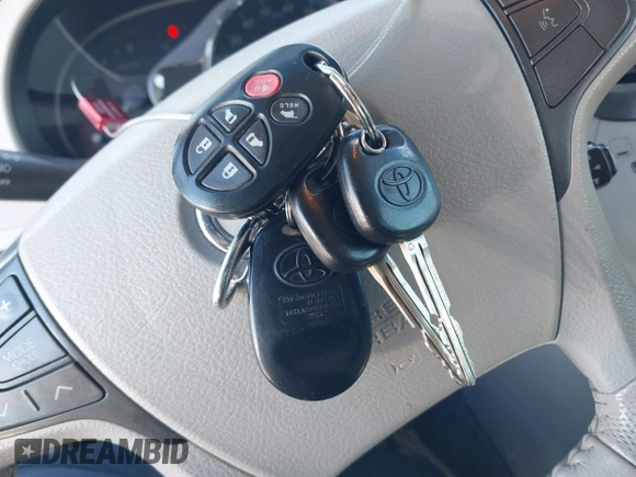 2013 Toyota Sienna XLE AAS with VIN 5TDYK3DCXDS379272, listed as a IAAI auction lot 41407282 with 240,491 mi miles and . Bid and sale history available at carsss.com. Image 11.