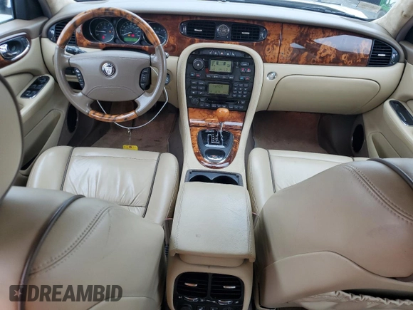 2007 Jaguar XJ with VIN SAJWA71B67SH12726, listed as a Copart auction lot 64840394 with 71,363 mi miles and Salvage Title. Bid and sale history available at carsss.com. Image 8.