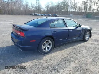 2014 Dodge Charger SXT with VIN 2C3CDXHG1EH207273, listed as a IAAI auction lot 41714382 with 152,023 mi miles. Bid and sale history available at carsss.com. Image 4.