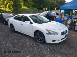 2014 Nissan Maxima SV with VIN 1N4AA5AP1EC483052, listed as a IAAI auction lot 42807542 with 319,387 mi miles and . Bid and sale history available at DreamBid. Image 1.