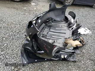 2025 Tesla Model 3 Long Range with VIN 5YJ3E1EA5SF889727, listed as a Copart auction lot 49207545 with 6,980 mi miles and Salvage Title. Bid and sale history available at carsss.com. Image 12.