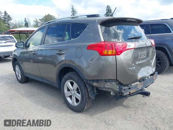 2013 Toyota RAV4 XLE with VIN JTMRFREV9DD024522, listed as a IAAI auction lot 42169755 with 164,493 mi miles and . Bid and sale history available at carsss.com. Image 3.