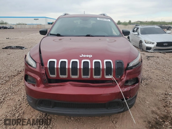 2015 Jeep Cherokee Sport z VIN 1C4PJLAB5FW677015, wystawiony jako Copart lot #58986705 z przebiegiem 112 446 mil mil oraz Szkoda całkowita • Salvage title. Historia ofert i sprzedaży dostępna na DreamBid. Obrazek 5.