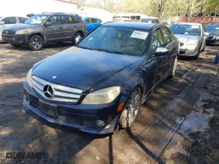 2009 Mercedes-Benz C-Class 3.0L Sport with VIN WDDGF54X19R074723, listed as a IAAI auction lot 42006997 with 149,700 mi miles. Bid and sale history available at carsss.com. Image 2.