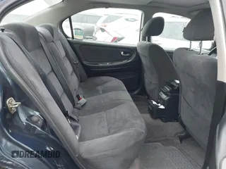 2002 Nissan Maxima GXE with VIN JN1DA31D72T410204, listed as a IAAI auction lot 42515430 with 91,406 mi miles and . Bid and sale history available at DreamBid. Image 8.