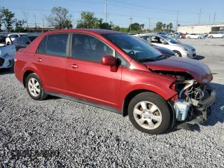 2010 Nissan Versa S with VIN 3N1BC1AP6AL443004, listed as a Copart auction lot 52010495 with 118,801 mi miles and Non Repairable. Bid and sale history available at DreamBid. Image 4.