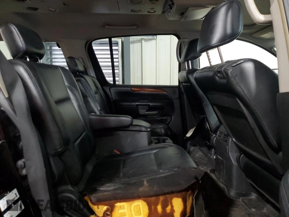 2010 Infiniti QX56 with VIN 5N3ZA0NE4AN903946, listed as a Copart auction lot 60535685 with 204,634 mi miles and Salvage title. Bid and sale history available at DreamBid. Image 11.
