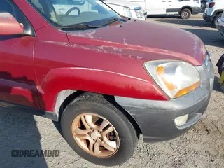 2005 Kia Sportage LX with VIN KNDJF723457078461, listed as a IAAI auction lot 41948080 with 104,330 mi miles and . Bid and sale history available at carsss.com. Image 12.
