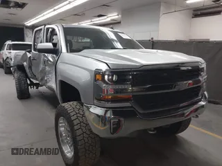 2018 Chevrolet Silverado 1500 LT with VIN 1GCVKREC1JZ151188, listed as a IAAI auction lot 42153618 with 82,391 mi miles and . Bid and sale history available at DreamBid. Image 1.