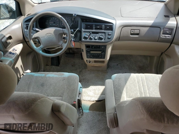 2000 Toyota Sienna LE z VIN 4T3ZF13C7YU259075, wystawiony jako Copart lot #58416105 z przebiegiem 235 788 mil mil oraz Szkoda całkowita • Salvage title. Historia ofert i sprzedaży dostępna na DreamBid. Obrazek 8.