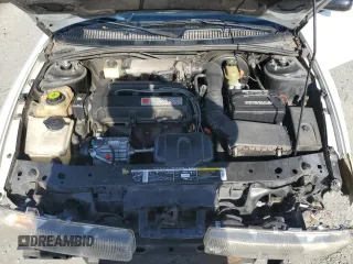 1996 Saturn SL with VIN 1G8ZK5279TZ162812, listed as a Copart auction lot 87079874 with 143,461 mi miles and Salvage title. Bid and sale history available at DreamBid. Image 12.