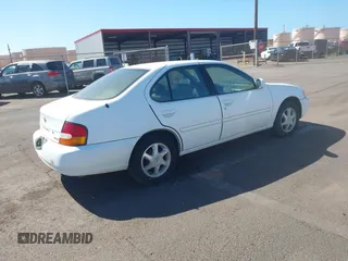 1999 Nissan Altima XE with VIN 1N4DL01D2XC125672, listed as a IAAI auction lot 41379153 with 183,685 mi miles. Bid and sale history available at carsss.com. Image 4.