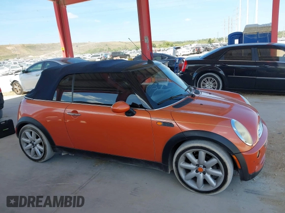 2005 MINI Convertible with VIN WMWRF334X5TF61026, listed as a IAAI auction lot 42125720 with 117,908 mi miles and . Bid and sale history available at DreamBid. Image 14.