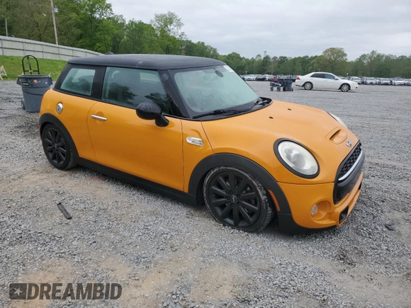 2015 MINI Hardtop S with VIN WMWXP7C52F2A41236, listed as a Copart auction lot 52600215 with 113,536 mi miles and Salvage Title. Bid and sale history available at DreamBid. Image 4.