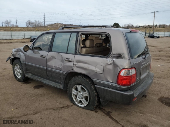 1999 Lexus LX 470 Luxury SUV with VIN JT6HT00WXX0052090, listed as a Copart auction lot 84533774 with NaN miles and Salvage Title. Bid and sale history available at carsss.com. Image 2.