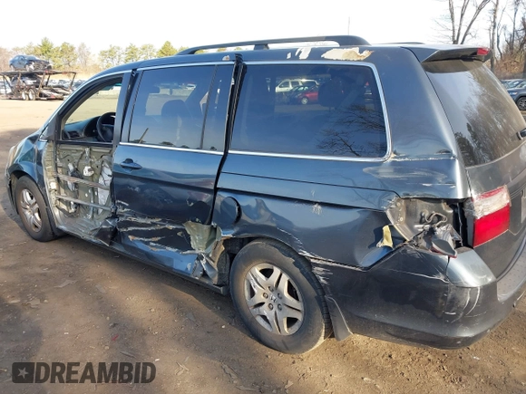 2005 Honda Odyssey EX-L with VIN 5FNRL38615B040637, listed as a IAAI auction lot 41920622 with 92,673 mi miles. Bid and sale history available at carsss.com. Image 6.