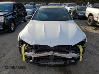 2021 BMW M5 with VIN WBS83CH01MCF15654, listed as a Copart auction lot 77427464 with 41,919 mi miles and Salvage Title. Bid and sale history available at carsss.com. Image 5.