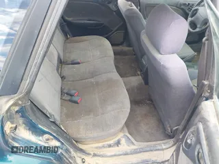 1999 Subaru Legacy L z VIN 4S3BK4355X6305664, wystawiony jako IAAI lot #42077758 z przebiegiem 70 585 mil mil oraz . Historia ofert i sprzedaży dostępna na DreamBid. Obrazek 8.