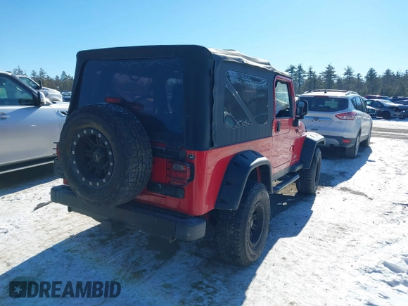 2005 Jeep Wrangler Unlimited with VIN 1J4FA44S05P375941, listed as a IAAI auction lot 41420299 with 138,859 mi miles. Bid and sale history available at carsss.com. Image 4.