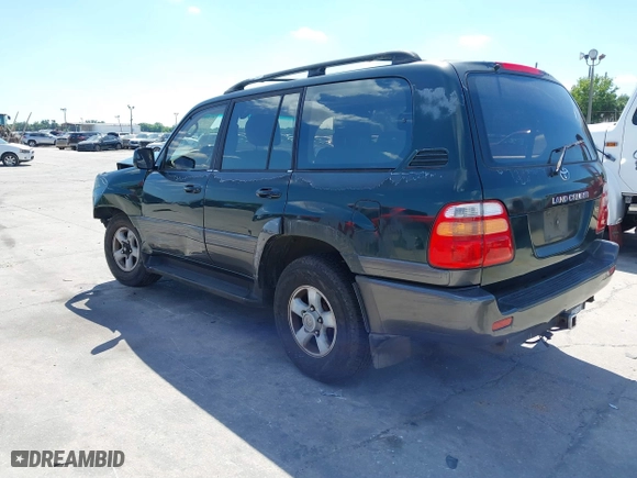 1998 Toyota Land Cruiser with VIN JT3HT05J2W0022171, listed as a IAAI auction lot 41886798 with 313,665 mi miles. Bid and sale history available at carsss.com. Image 3.