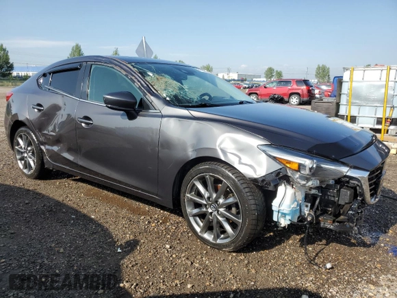 2018 Mazda 3 Grand Touring z VIN 3MZBN1W36JM225021, wystawiony jako Copart lot #61100855 z przebiegiem 155 817 mil mil oraz Czysty tytuł • Clean title. Historia ofert i sprzedaży dostępna na DreamBid. Obrazek 4.