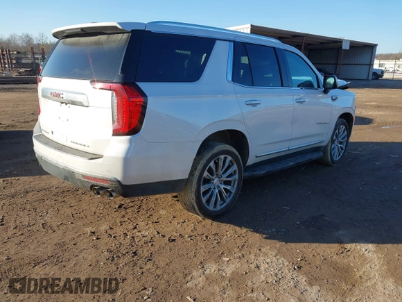2021 GMC Yukon Denali with VIN 1GKS2DKL2MR458128, listed as a IAAI auction lot 41343876 with 64,732 mi miles. Bid and sale history available at carsss.com. Image 4.
