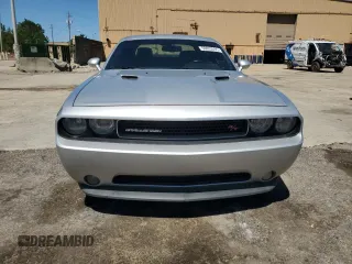 2012 Dodge Challenger R/T z VIN 2C3CDYBT0CH259731, wystawiony jako Copart lot #58033035 z przebiegiem 142 427 mil mil oraz Czysty tytuł • Clean title. Historia ofert i sprzedaży dostępna na DreamBid. Obrazek 5.