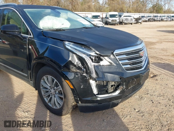 2019 Cadillac XT5 Luxury FWD z VIN 1GYKNCRSXKZ102866, wystawiony jako IAAI lot #41335840 z przebiegiem 59 563 mil mil oraz . Historia ofert i sprzedaży dostępna na DreamBid. Obrazek 6.