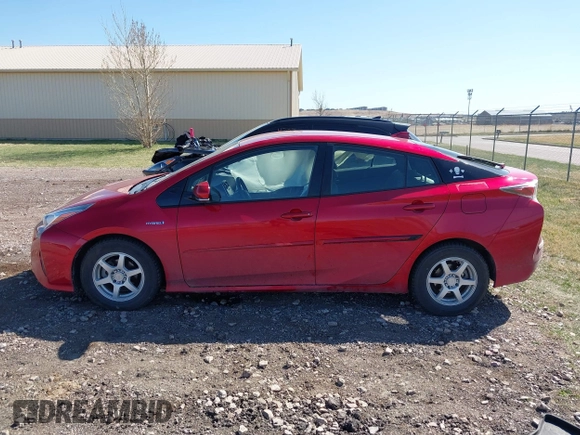 2016 Toyota Prius Four z VIN JTDKARFU0G3502097, wystawiony jako IAAI lot #42053915 z przebiegiem 102 252 mil mil oraz . Historia ofert i sprzedaży dostępna na DreamBid. Obrazek 14.