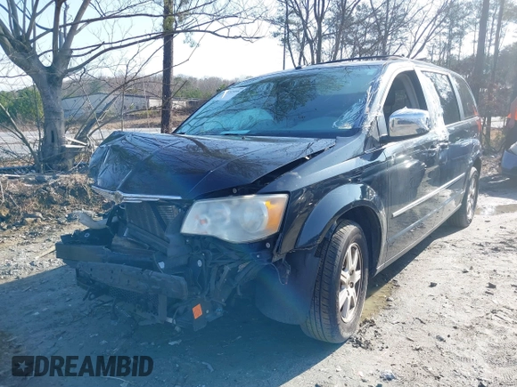 2009 Chrysler Town & Country Touring with VIN 2A8HR54X39R629941, listed as a IAAI auction lot 41525899 with 151,803 mi miles and . Bid and sale history available at DreamBid. Image 2.