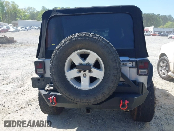 2014 Jeep Wrangler Unlimited Sport with VIN 1C4BJWDG4EL292421, listed as a IAAI auction lot 42034343 with 157,820 mi miles. Bid and sale history available at carsss.com. Image 16.