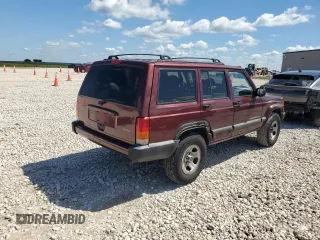2001 Jeep Cherokee Sport with VIN 1J4FT48S21L538823, listed as a Copart auction lot 56385885 with 157,808 mi miles and Clean title. Bid and sale history available at DreamBid. Image 3.