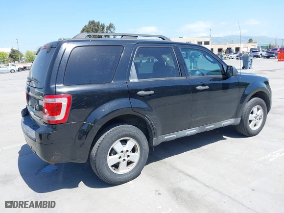 2012 Ford Escape XLT with VIN 1FMCU0D71CKC10734, listed as a IAAI auction lot 42065049 with 207,698 mi miles. Bid and sale history available at carsss.com. Image 4.